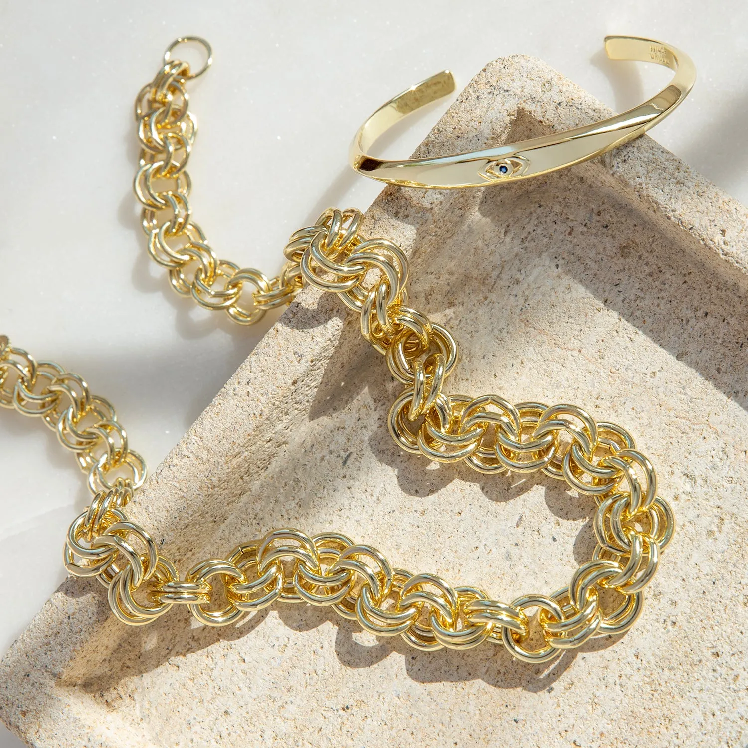 angled flat face cuff with evil eye